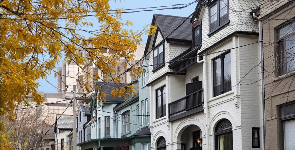 Toronto-street-of-old-victorian-houses-with-gables-and-painted-brick